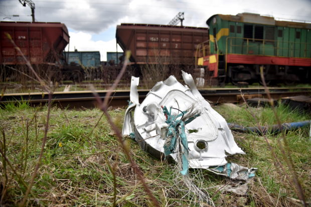 The debris of a Russian missile used to attack one of the railway facilities during Russia's invasion of Ukraine, lies on the ground, in the Lviv region, Ukraine April 25, 2022. REUTERS/Pavlo Palamarchuk