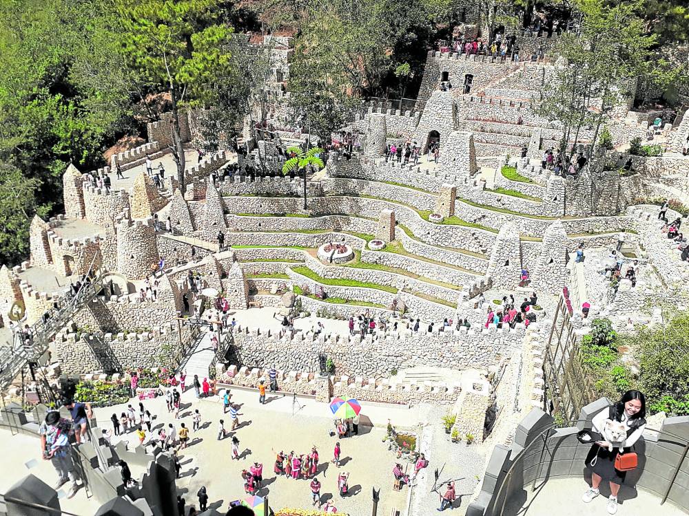 IGOROT KINGDOM Tourists visit the Igorot Stone Kingdom along the Long-long Road at Barangay Pinsao in Baguio City in this photo taken on March 13. Local tourism officials said the number of tourists might reach more than 50,000 during the Holy Week. ALLAN MACATUNO