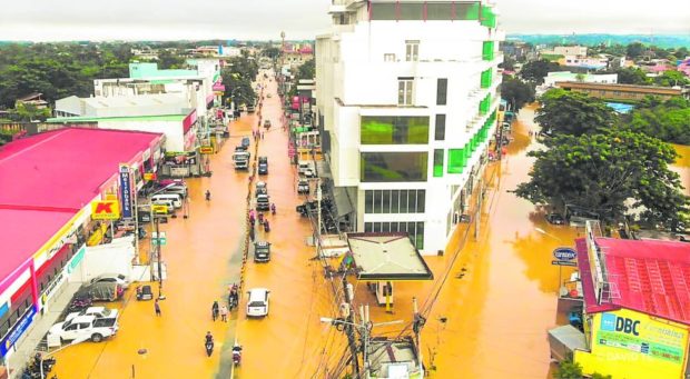 Flooded streets in Tuguegarao. STORY: Protecting farmers, environment top issues of N. Luzon voters