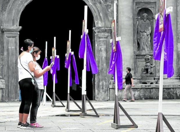 RENEWED DEVOTIONS Many Filipino Catholics are resuming Lenten traditions missed for two years due to the pandemic. Devotees get at early start on Holy Wednesday at San Agustin Church in Intramuros, Manila. —RICHARD A. REYES