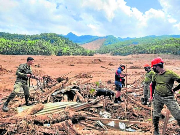 Rescuers continue to look for at least 60 people buried in a landslide at Barangay Kantagnos in Baybay City.. STORY: Retrieval ops for Leyte landslide victims end