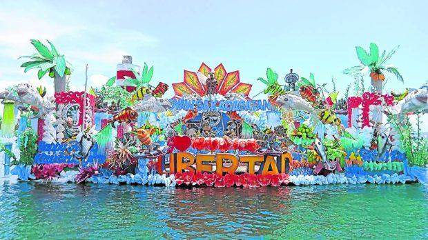 BURST OF COLORS “Gakit” (bamboo rafts) bursting with colors highlight the 21st Hugyaw sa Kadagatan Festival in Kauswagan town, Lanao del Norte province, held on April 24 after a two-year hiatus due to the coronavirus pandemic. STORY: Lanao del Norte coastal town reopens doors to tourists