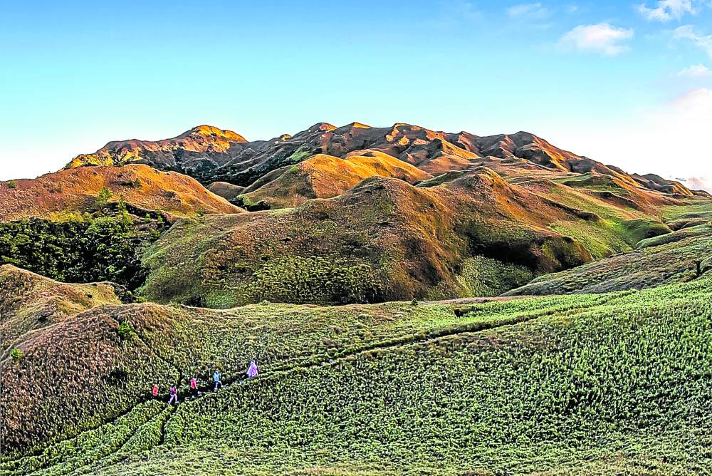 Mt. Pulag, Luzon’s highest peak, enters the list of the country’s protected areas under new laws signed by President Duterte 