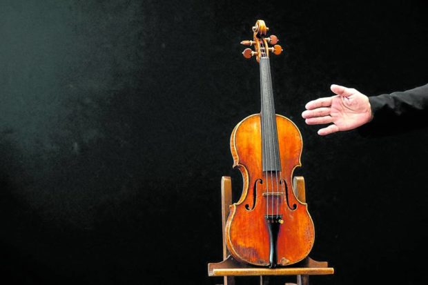  A rare 1736 violin by Italian luthier Guarneri del Gesu is put on display