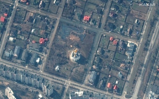 Satellite images show long trench at Ukrainian mass grave site, Maxar says