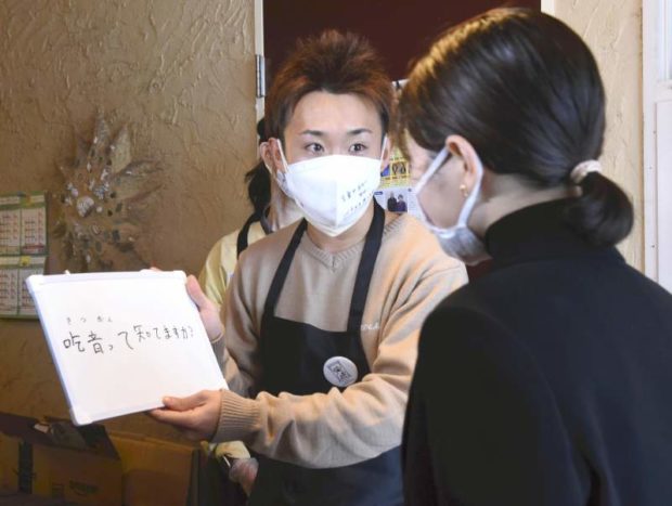 Pop-up cafe in Tokyo helps young workers who stutter gain confidence through customer service