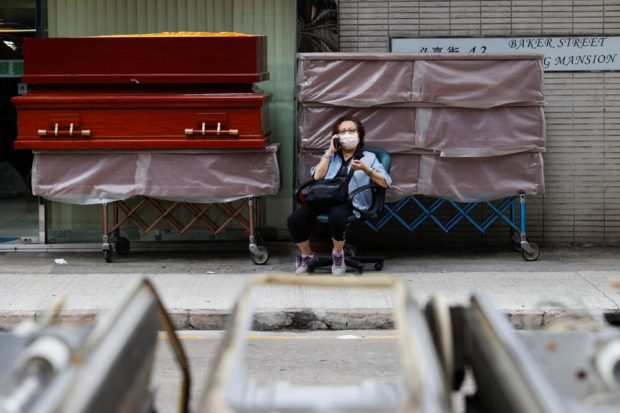 Hong Kong questions costs of COVID rules on mental health, livelihoods