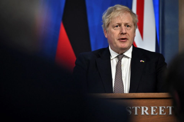 UK's Johnson seeks to put fine behind him with immigration plan