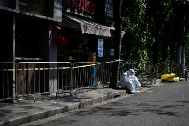 COVID-shaming pits neighbor against neighbor in locked-down Shanghai