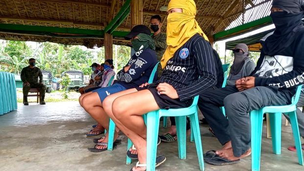Former NPA rebels who surrendered in Albay. STORY: Over 10,000 ex-rebels have received livelihood aid since 2016