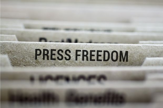 Folders with focus on one marked PRESS FREEDOM. STORY: Despite gains, PH still ‘difficult’ place for press