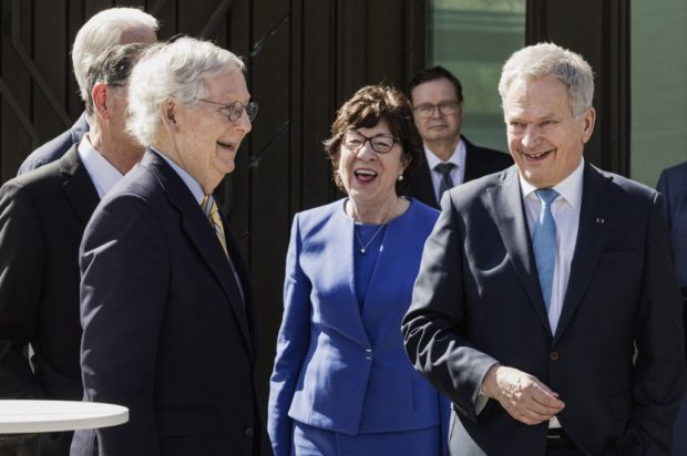 (L-R) US Senate Minority Leader Mitch McConnell, US Republican Senator Susan Collins and Finland's President Sauli Niinisto chat after their meeting at the President's official residence Mantyniemi in Helsinki, Finland, on May 16, 2022. (Photo by Roni Rekomaa / Lehtikuva / AFP) / Finland OUT