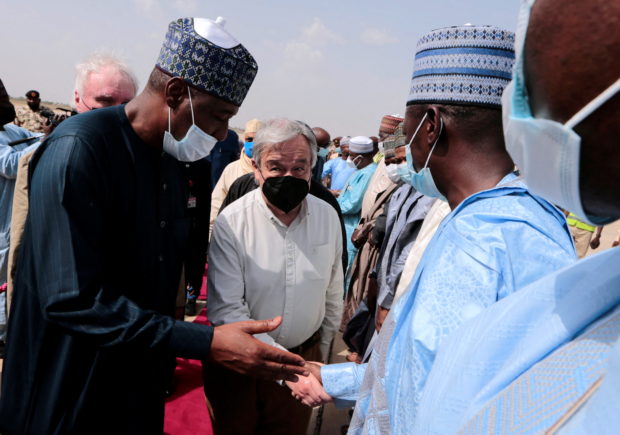 United Nations Secretary General Antonio Guterres is introduced to Borno state officials by Borno State Governor Babagana Zulum on arrival at Maiduguri International Airport Borno, Nigeria May 3, 2022. REUTERS/Afolabi Sotunde
