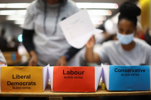 Ballots are counted during local elections, at Wandsworth Town Hall, London, Britain May 6, 2022. REUTERS/Hannah McKay