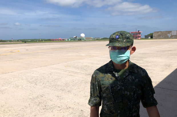 FILE PHOTO: A soldier is seen at Makung Air Force Base in Taiwan's offshore island of Penghu, September 22, 2020. REUTERS/Yimou Lee