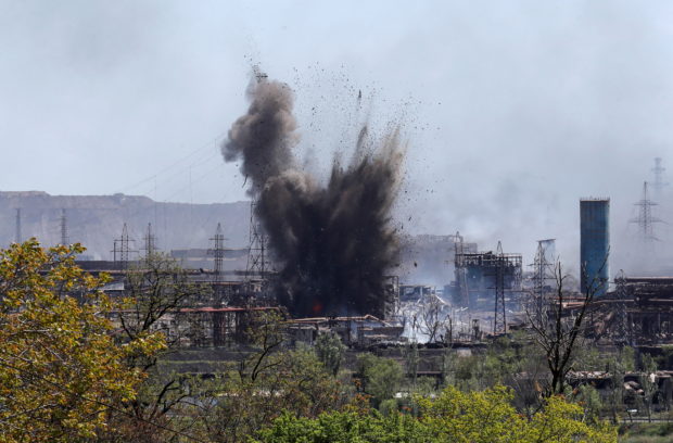 A view shows an explosion at a plant of Azovstal Iron and Steel Works during Ukraine-Russia conflict in the southern port city of Mariupol, Ukraine May 11, 2022. REUTERS/Alexander Ermochenko
