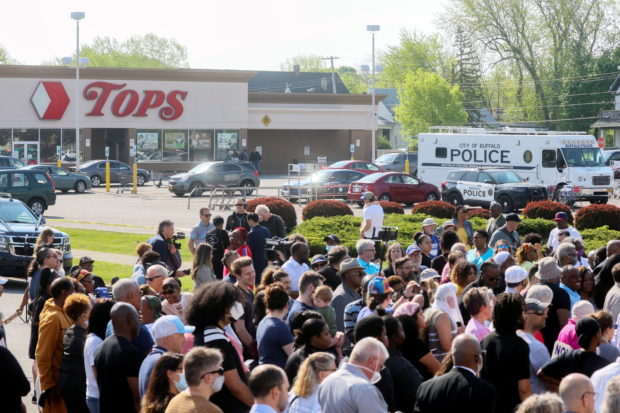 Mourners gather for a vigil for victims of the shooting at TOPS supermarket in Buffalo, New York, U.S. May 15, 2022.  REUTERS/Brendan McDermid