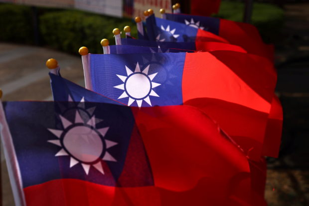 FILE PHOTO: Taiwan flags can be seen at a square ahead of the national day celebration in Taoyuan, Taiwan, October 8, 2021. REUTERS/Ann Wang