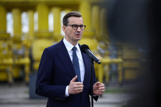 FILE PHOTO: Poland's Prime Minister Mateusz Morawiecki speaks during a news conference near the gas installation at a Gaz-System gas compressor station in Rembelszczyzna, outside Warsaw, Poland, April 27, 2022. REUTERS/Kacper Pempel/File Photo