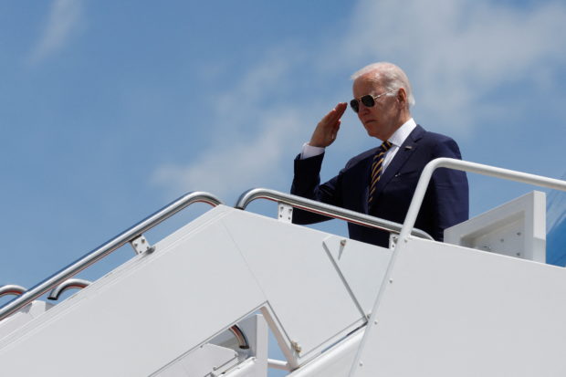 U.S. President Joe Biden boards Air Force One to depart for his first trip to Asia as sitting president from Joint Base Andrews, Maryland, U.S. May 19, 2022. REUTERS/Jonathan Ernst
