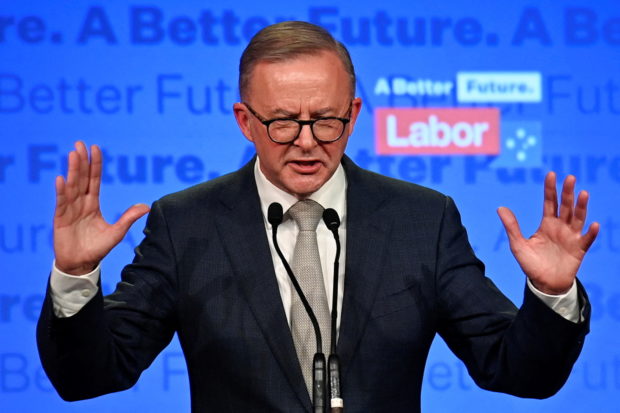 Anthony Albanese, leader of Australia's Labor Party, addresses supporters after incumbent Prime Minister and Liberal Party leader Scott Morrison conceded defeat in the country's general election, in Sydney, Australia May 21, 2022. REUTERS/Jaimi Joy