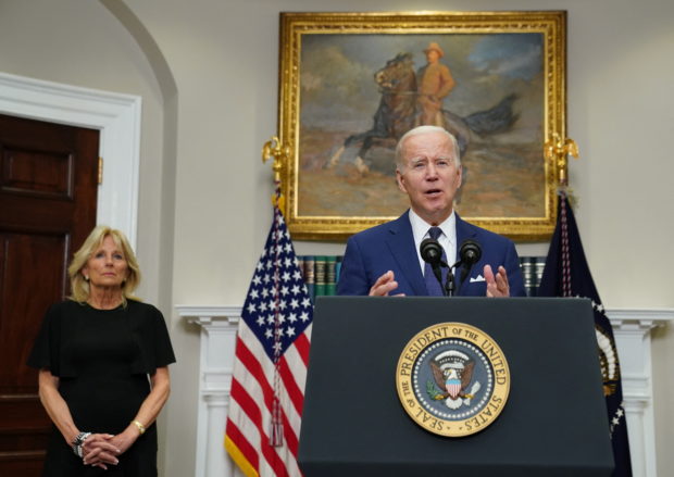 U.S. first lady Jill Biden looks on as U.S. President Joe Biden makes a statement about the school shooting in Uvalde, Texas shortly after the president returned to Washington from his trip to South Korea and Japan, at the White House in Washington, U.S. May 24, 2022. REUTERS/Kevin Lamarque