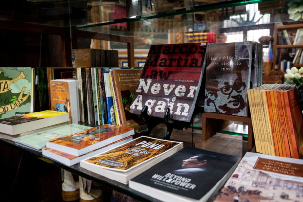 A book on martial law under the late dictator Ferdinand Marcos is displayed at a bookstore in Manila, Philippines, May 19, 2022. Picture taken May 19, 2022. REUTERS/Lisa Marie David