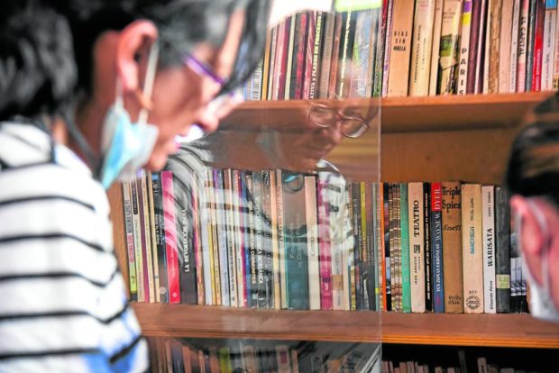 Milred organises books at the prison that offers her and fellow inmates access to a small library