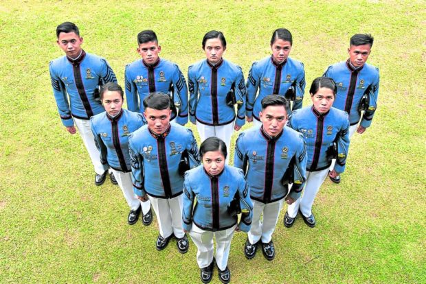 TOP GRADUATES The top 10 graduates of the 214-member Philippine Military Academy’s “Bagsik Diwa” Class of 2022, led by Cadet First Class Krystlenn Ivany Quemado (bottom center), will be commissioned as junior officers on May 15 during their commencement exercises in Baguio City. —EV ESPIRITU PMA top graduating 