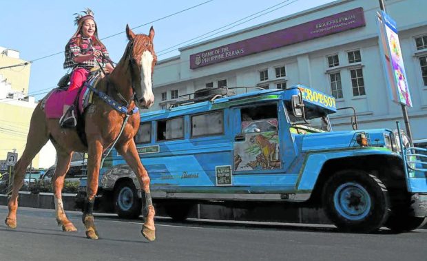 Ibaloy woman on horseback in Baguio. STORY: Baguio's gains, losses in modern charter