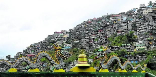 Baguio City hillside structures. STORY: With no space left, Baguio buys land in nearby towns
