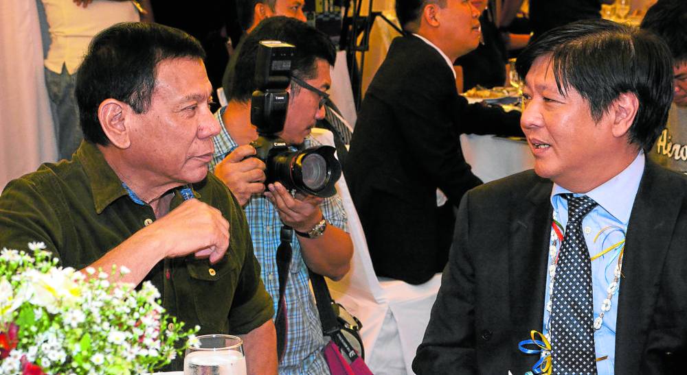 President Duterte chats with then Sen. Ferdinand Marcos Jr.