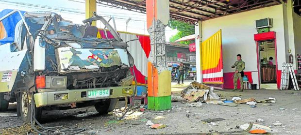 Damaged garage of D’ Biel Transportation in Isabela City STORY: The blast at the garage of D’ Biel Transportation in Isabela City leaves a truck damaged and two injured