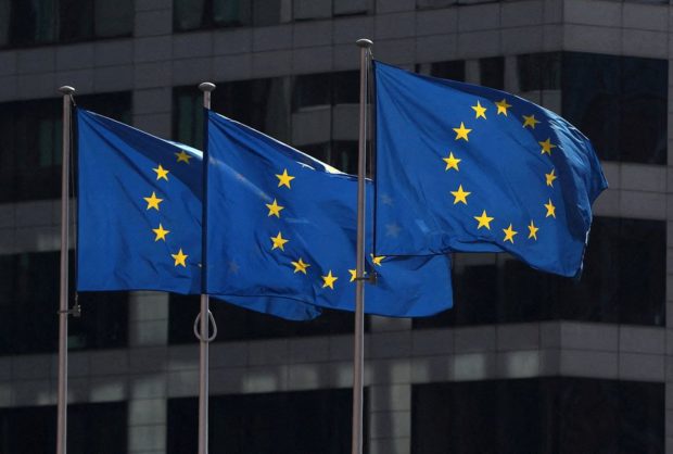 European Union flags fly outside the European Commission 