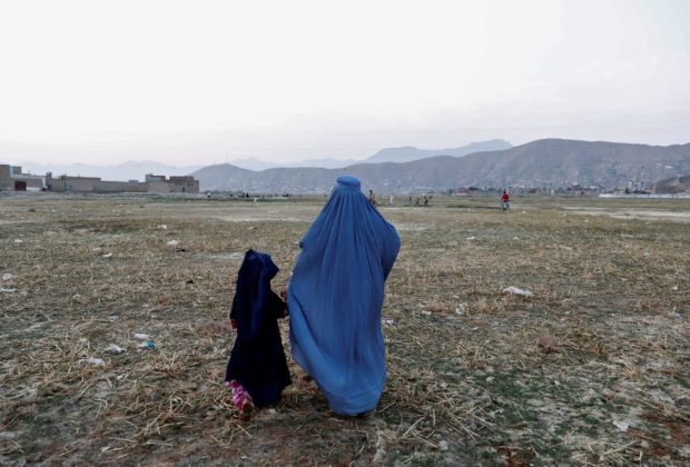 Taliban orders Afghan women to cover faces again