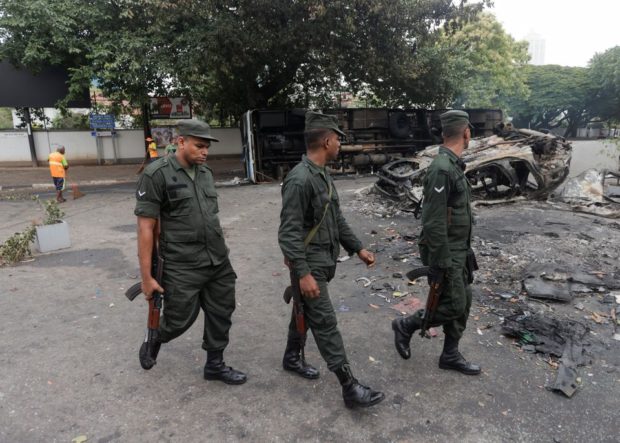 Sri Lanka calls for new governement a day after clashes kill eight
