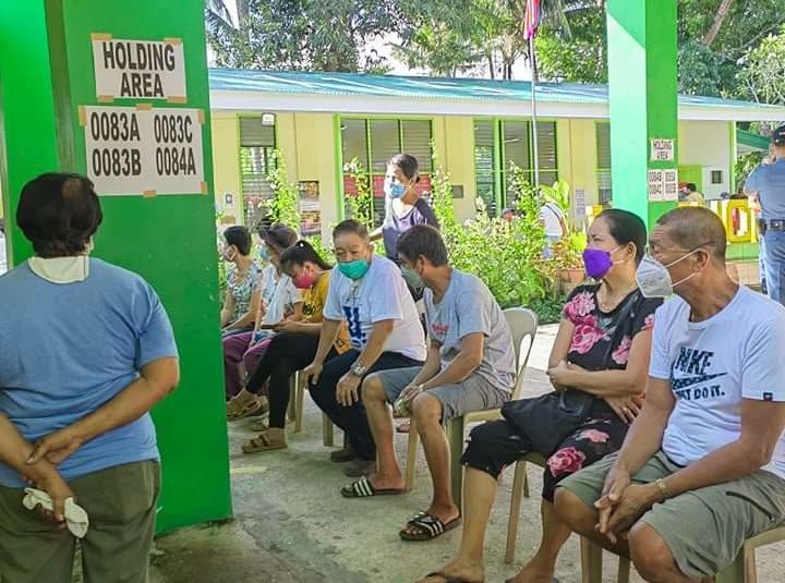 Senior citizens were among the first to lined up to cast their vote at Suqui Elementary School in Calapan City