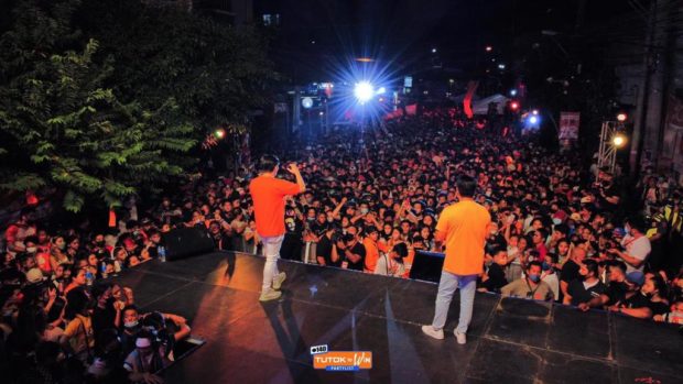 Tutok to Win #140 partylist first nominee Sam Verzosa and Willlie Revillame speak to the large crowd of supporters.