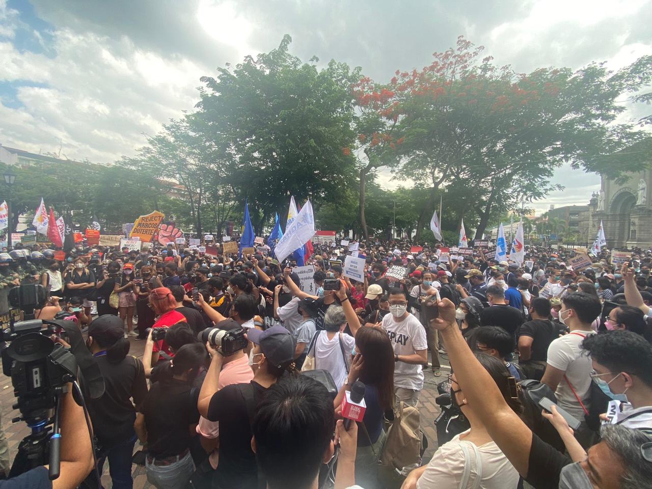 Around 400 people stage a protest near the main office of the Commission on Elections (Comelec) in Intramuros, Manila, on Tuesday, May 10, 2022