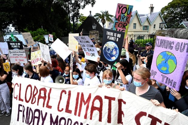 Climate change protest throws Sydney traffic into chaos, 11 arrested