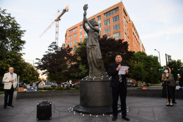 Wang Dan, a leader of the Tiananmen Square protests, speaks during a vigil to mark the 33rd anniversary of the Tiananmen Sqiuare massacre at the Victims of Communism Memorial in Washington, DC, on June 3, 2022. (Photo by Nicholas Kamm / AFP)