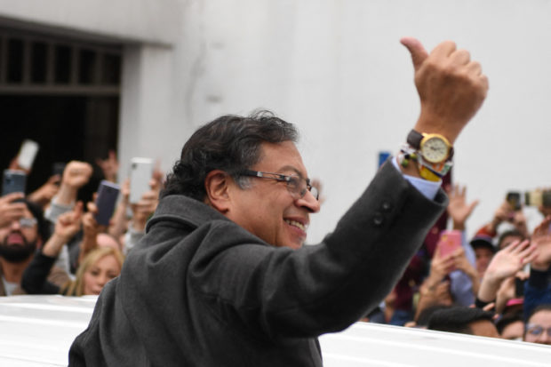 Colombian Leftist Presidential Candidate Gustavo Petro Gives A Thumbs Up As He Arrives At A Polling Station During The Second Round Of Presidential Elections In Bogota, On June 19, 2022. - Colombians Vote For A New President In An Election Full Of Uncertainty, As Former Guerrilla Gustavo Petro And Millionaire Businessman Rodolfo Hernández Compete For Power In A Country Fraught With Poverty, Violence And Other Widespread Ills.  (Photo By Daniel Muñoz / Afp)