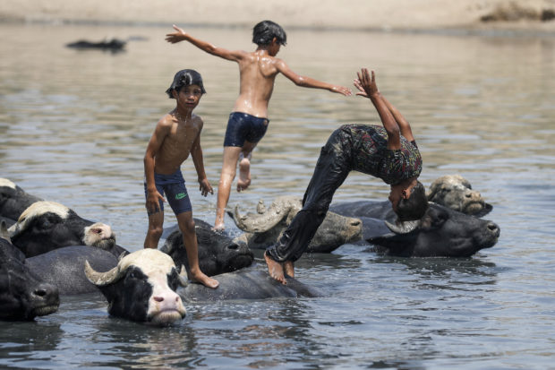 For Iraqis a sweltering summer of ‘hell’ has begun