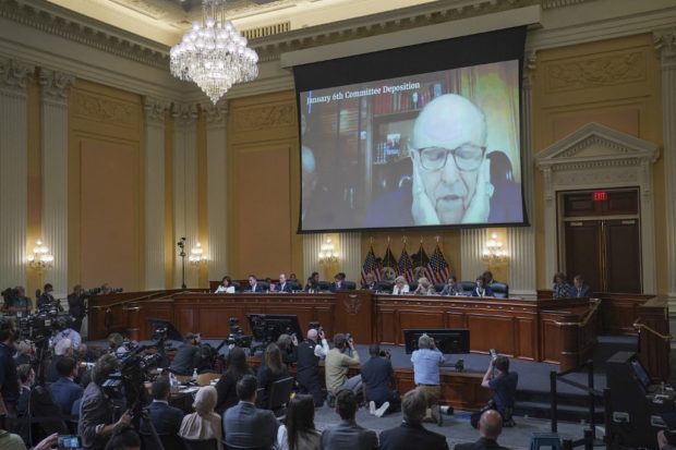 A video of Rudy Giuliani is shown on a screen during the fifth hearing held by the Select Committee to Investigate the January 6th Attack on the U.S. Capitol