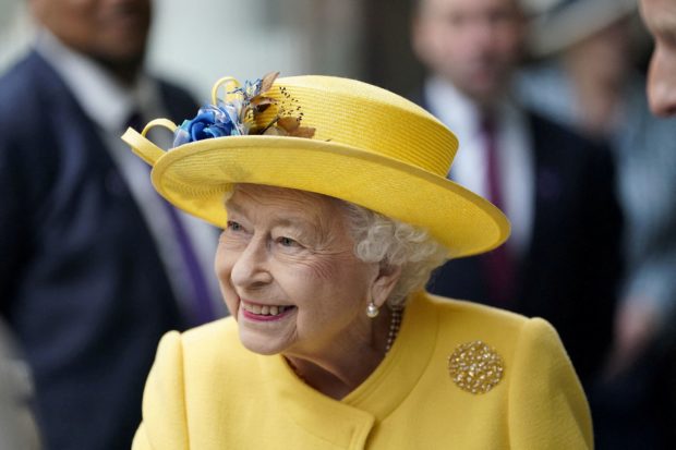 FILE PHOTO: Britain's Queen Elizabeth meets staff of the Crossrail project and Elizabeth Line as they mark the completion of London's Crossrail project at Paddington station in London, Britain May 17, 2022. Andrew Matthews/Pool via REUTERS