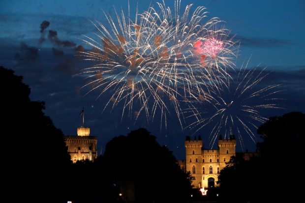Fireworks explode above Windsor Castle during the lighting of the Principal Platinum Jubilee Beacon ceremony during the Queen's Platinum Jubilee celebrations in Windsor, Britain, June 2, 2022. REUTERS/Peter Nicholls