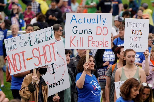  People participate in the 'March for Our Lives' rally against gun violence. STORY: Gun reform plan in US Senate draws key Republican support