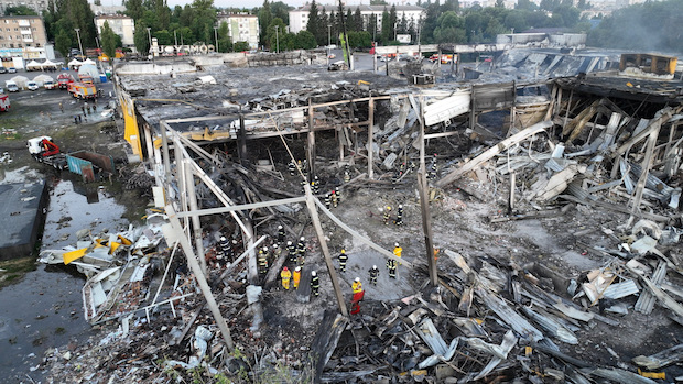 Rescuers at the rubble of a Ukrainian mall hit by a Russian missile. STORY: 36 still missing after Russian missile strike on mall kills 18
