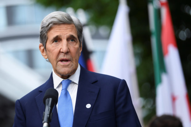 FILE PHOTO: U.S. climate envoy John Kerry gives a statement ahead of the meeting of the G7 Climate, Energy and Environment Ministers during the German G7 Presidency at the EUREF-Campus in Berlin, Germany May 26, 2022. REUTERS/Annegret Hilse