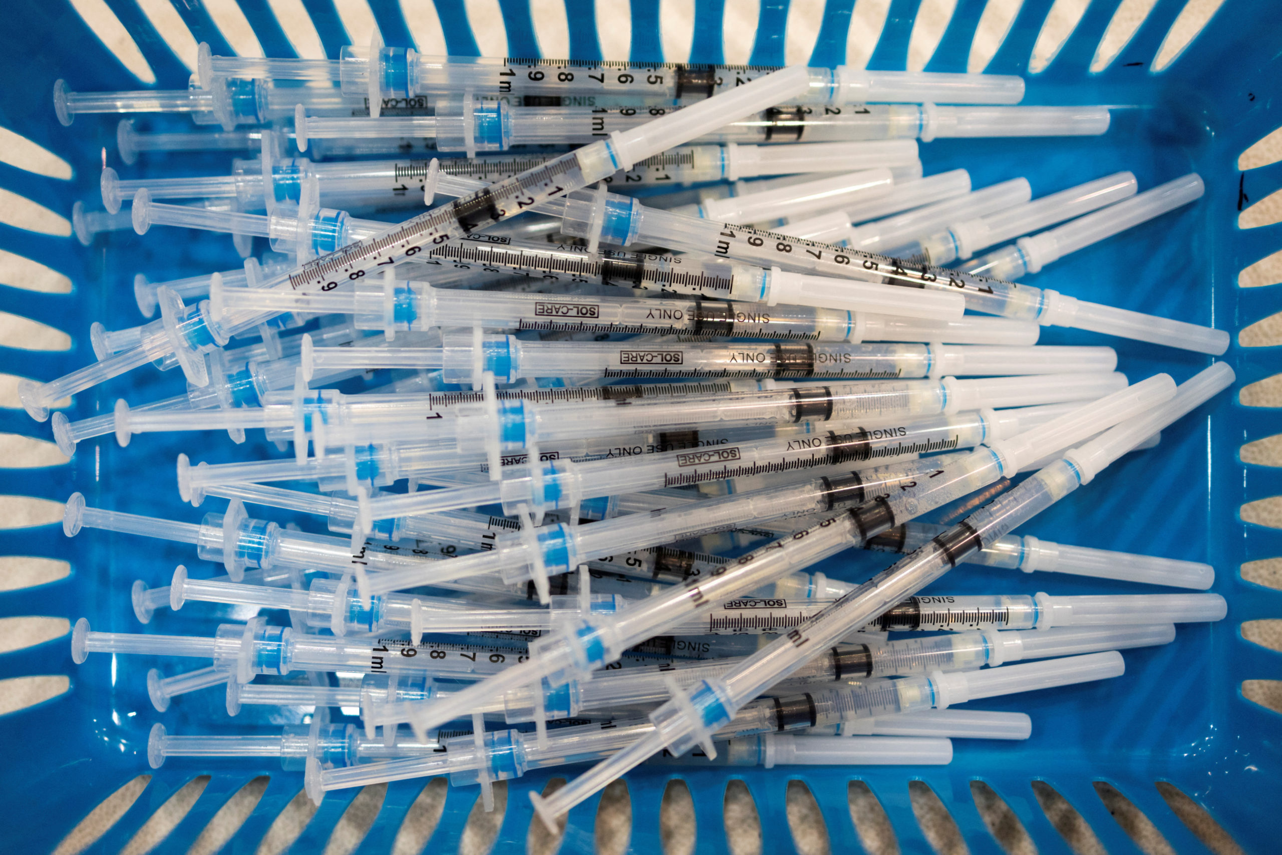 FILE PHOTO: Doses of the Pfizer-BioNTech vaccine against the coronavirus disease (COVID-19) are pictured at a booster clinic for 12 to 17-year-olds in Lansdale, Pennsylvania, U.S., January 9, 2022. REUTERS/Hannah Beier/File Photo
